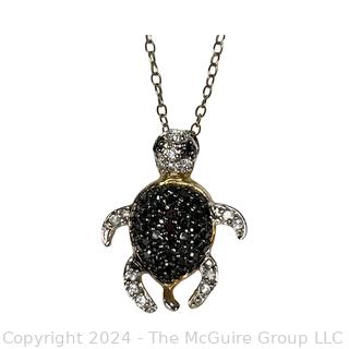 Two (2) Pendants. Sterling Silver Turtle and 825 Marcasite Cross