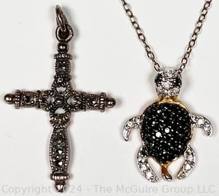 Two (2) Pendants. Sterling Silver Turtle and 825 Marcasite Cross