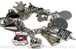 Sterling Silver Bracelet with Charms, Some Sterling.  Total Weight 49 Grams