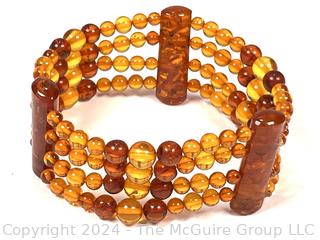 Bi Color Amber Bead Bracelet, One Strand Broken. Loose beads included.