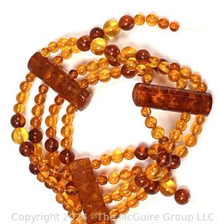 Bi Color Amber Bead Bracelet, One Strand Broken. Loose beads included.