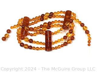 Bi Color Amber Bead Bracelet, One Strand Broken. Loose beads included.