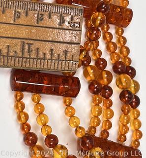 Bi Color Amber Bead Bracelet, One Strand Broken. Loose beads included.