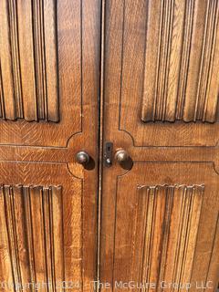 Solid Oak Paneled Two Door Linenfold Gents Wardrobe. 36 x 21 x 73”