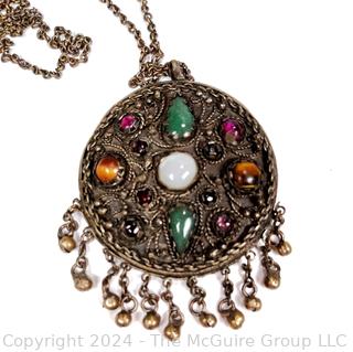 Round Middle Eastern Disk Pendant with Gemstones. 