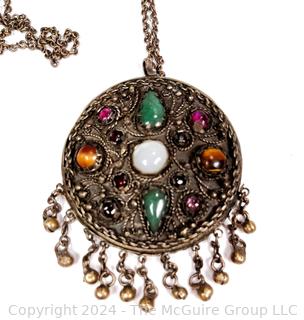 Round Middle Eastern Disk Pendant with Gemstones. 