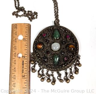 Round Middle Eastern Disk Pendant with Gemstones. 