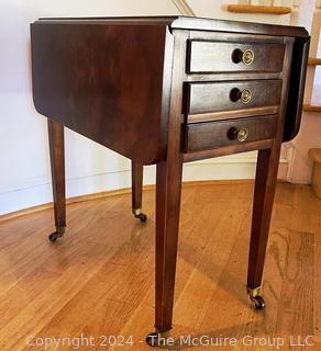 Sheraton Three Drawer Drop-Leaf Side or End Table on Casters.  31 x 25 x 26”