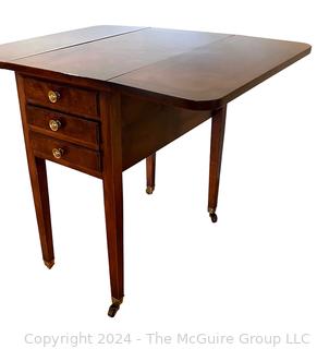 Sheraton Three Drawer Drop-Leaf Side or End Table on Casters.  31 x 25 x 26”