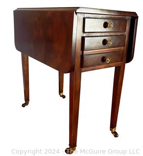 Sheraton Three Drawer Drop-Leaf Side or End Table on Casters.  31 x 25 x 26”