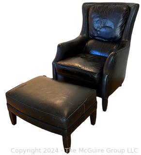 Arhaus Black Leather Wing Chair with Ottoman.  Some damage.