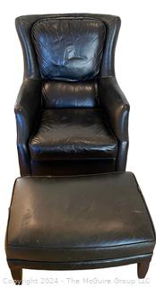 Arhaus Black Leather Wing Chair with Ottoman.  Some damage.