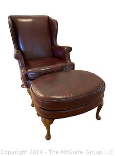 Brown Leather Wing Back Library Armchair with Foot Stool. 30 x 35 x 41”