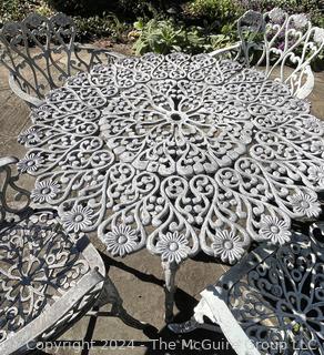 Set of Cast Metal Scroll Work Garden Set Including Table with Four Chairs