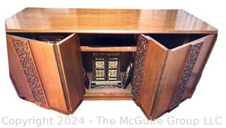 1960's Mid Century Hand Carved Asian Teak Desk with Front Curio Cabinet Behind Fold Away Doors in the front.  Measures 70"L x 32"W x 30"T (Removal for this item is Sunday, Nov. 3 12-2pm at a residence in Arlington, VA to be provided to winning bidder)      




