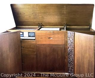 1960's Mid Century Hand Carved Asian Teak Stereo Console with Fold Away Doors.  Measures 70"L x 25"D x 40"T (Removal for this item is Sunday, Nov. 3 12-2pm at a residence in Arlington, VA to be provided to winning bidder)      




