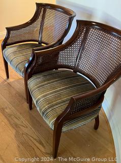 Pair of Hickory Chair Co. Cane Back Arm Chairs.  One with damage.