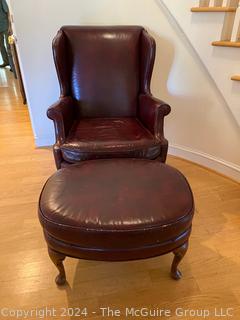 Brown Leather Wing Back Library Armchair with Foot Stool. 30 x 35 x 41”