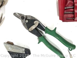 Assortment of Hand Tools: Clamps, pliers, nippers; pry-bar, and roll of wire