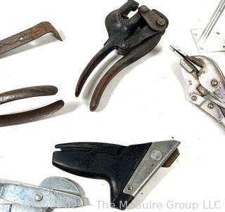 Assortment of Hand Tools: Clamps, pliers, nippers; pry-bar, and roll of wire