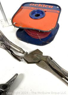 Assortment of Hand Tools: Clamps, pliers, nippers; pry-bar, and roll of wire