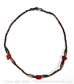 Shell Necklace with Red Beads.