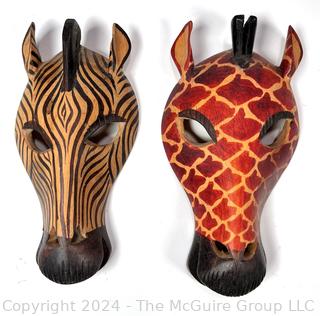 Two (2) Carved African Zebra and Giraffe Masks