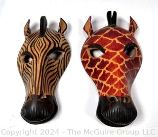 Two (2) Carved African Zebra and Giraffe Masks