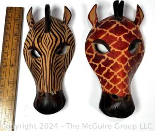 Two (2) Carved African Zebra and Giraffe Masks