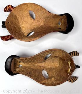 Two (2) Carved African Zebra and Giraffe Masks