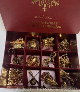 Box of Danbury Mint Gold Metal Christmas Ornaments