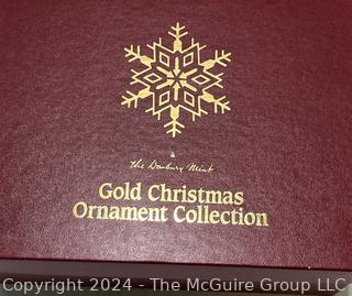 Box of Danbury Mint Gold Metal Christmas Ornaments