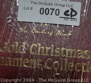 Box of Danbury Mint Gold Metal Christmas Ornaments