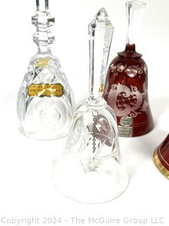 Four (4) Crystal, Glass & Porcelain Hand Bells
