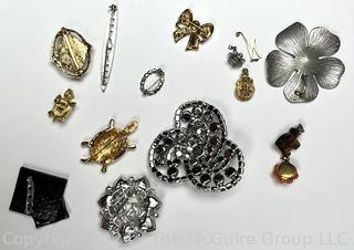 Group of Costume Jewelry Brooches and Pendants  Including Trifari