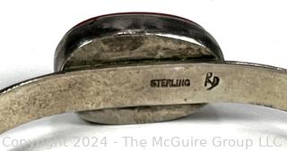 Sterling Silver Cuff Bracelet with Red Inset Stone Center, Signed by Desgner.