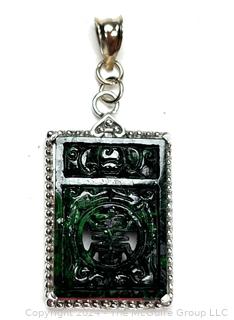 Carved Spinach Green Jadeite Good Fortune Pendant in Silver Surround with 14KT Bail. 