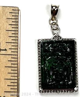 Carved Spinach Green Jadeite Good Fortune Pendant in Silver Surround with 14KT Bail. 