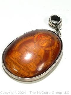 Cabochon Buddha Carved Amber Pendant with Sterling Silver Mounting