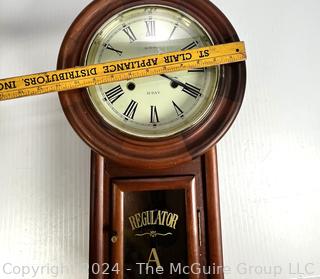 La Cloche 31 Day Wall Clock in Case