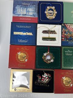 Twelve (12) White House and Swarovski Christmas Ornaments
