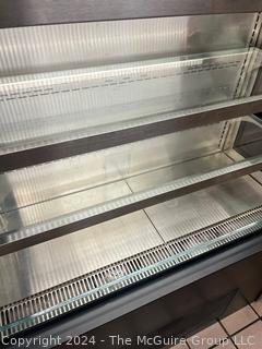 OASIS Refrigerated 5 Shelf Merchandiser with Pull Down Screen. Model B42.7250  SN 1218288 FV 335199