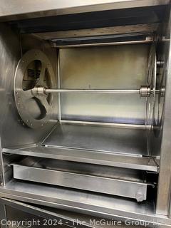 HENNY PENNY SCR-8 Sure Chef Rotisserie.  Electric, with THERMA-VEC EVEN HEAT PROCESS, Radiant Heat w/ Cross-Flow Convection.  8 Spits with a Capacity of 40 chickens at once. Stainless Steel Construction