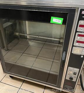 HENNY PENNY SCR-8 Sure Chef Rotisserie.  Electric, with THERMA-VEC EVEN HEAT PROCESS, Radiant Heat w/ Cross-Flow Convection.  8 Spits with a Capacity of 40 chickens at once. Stainless Steel Construction