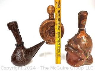 Three (3) Leather Covered Decanters