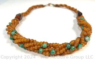 Twisted Multi Strand Amber Colored Bead Necklace