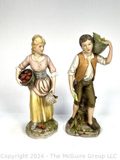 Couple with Apple Baskets Porcelain Figurines.  13" Tall