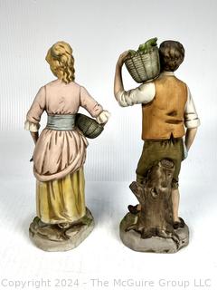 Couple with Apple Baskets Porcelain Figurines.  13" Tall