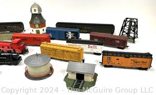 H-O Scale Model Train with Building and Scenery Pieces