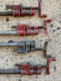 Four (4) Adjustable Woodworking Pipe Clamps Tools